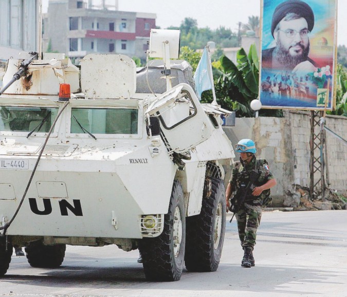 Portatori di pace - Un blindato della missione Unifil in pattugliamento a Beirut   - Ansa