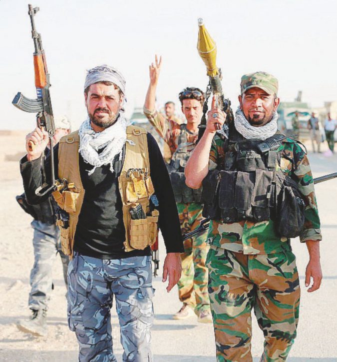 Prima linea - Miliziani sciiti fedeli a Baghdad - Ansa