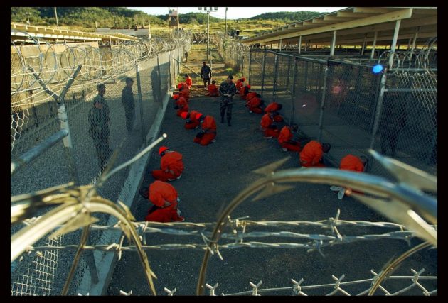 The Senate Select Committee on Intelligence released a report on the CIA's interrogation practices. The report said the CIA misled Americans and government policymakers about the effectiveness of the program that was secretly put into place after the 9/11 terror attacks. PICTURED: Jan 18, 2002; Guantanamo Bay, Cuba - (File Photo) Taliban and al-Qaida detainees in orange jumpsuits sit in a holding area during in-processing to the temporary detention facility. The detainees will be given a basic physical exam by a doctor before entering cells. (Credit Image: Shane T.McCoy/ZUMA Press/ZUMAPRESS.com) LaPresseAutorizzazione da richiederemassimo.zanotti@lapresse.itOnly Italy