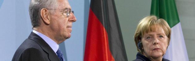 Monti sulla via di Berlino: “L’Italia ora non chiede aiuti”. Draghi: “Controllo vero sui bilanci nazionali”