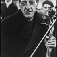 Former member of the Barcelona Philharmonic at a concentration camp for Spanish refugees. Bram, France. March 1939. © Robert Capa / International Center of Photography / Magnum Photos