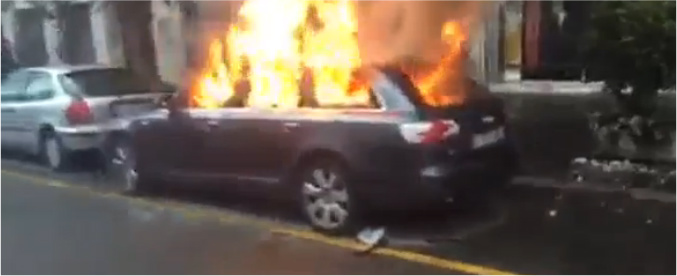 Copertina di No Expo, guerriglia urbana: incendiata una banca