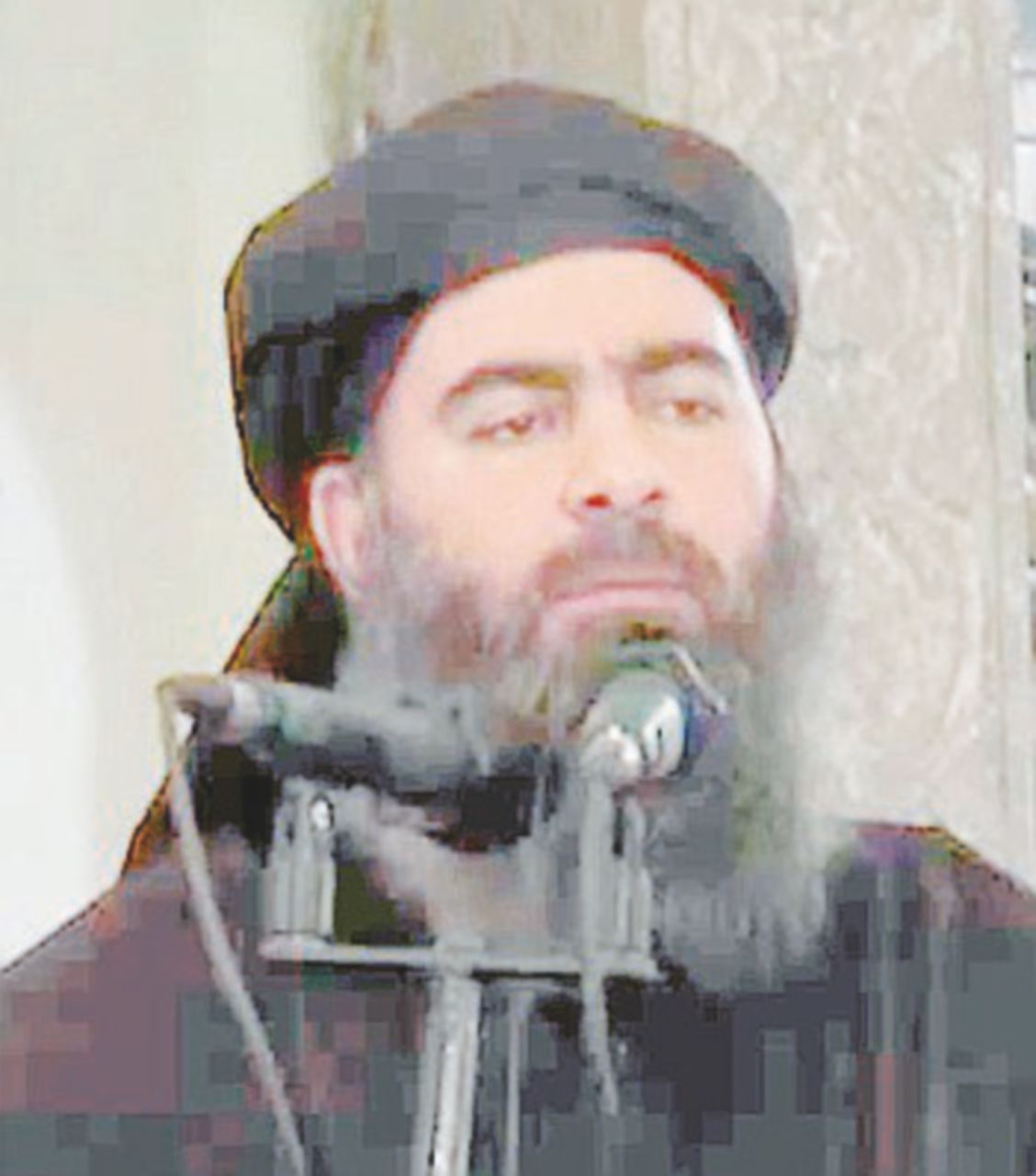 Califfo - Al Baghdadi regna da due anni - Ansa Funerale in chiesa per il 17° miliziano dello Stato islamico ucciso in Siria