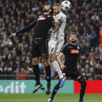 Real Madrid’s French striker Karim Benzema (C) goes for a header to score a goal, the first against Napoli, during their UEFA Champions League round of 16 match at Santiago Bernabeu stadium in Madrid, Spain, 15 February 2017. EFE/JuanJo Martin