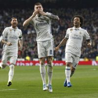 Real Madrid’s German midfielder Toni Kroos (C) jubilates a goal, the second against Napoli, during their UEFA Champions League round of 16 first leg match at Santiago Bernabeu stadium in Madrid, Spain, 15 February 2017. EFE/Kiko Huesca