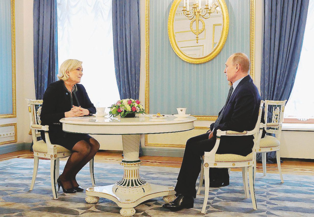 Vis-à-vis - Vladimir Putin e la candidata alle Presidenziali francesi, Marine Le Pen, al Cremlino - Ansa Putin la volpe: “Non tramo per la Le Pen”