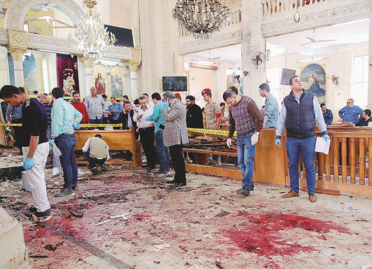 Isis, bombe e kamikaze contro i cristiani: 45 morti Isis, bombe e kamikaze contro i cristiani: 45 morti