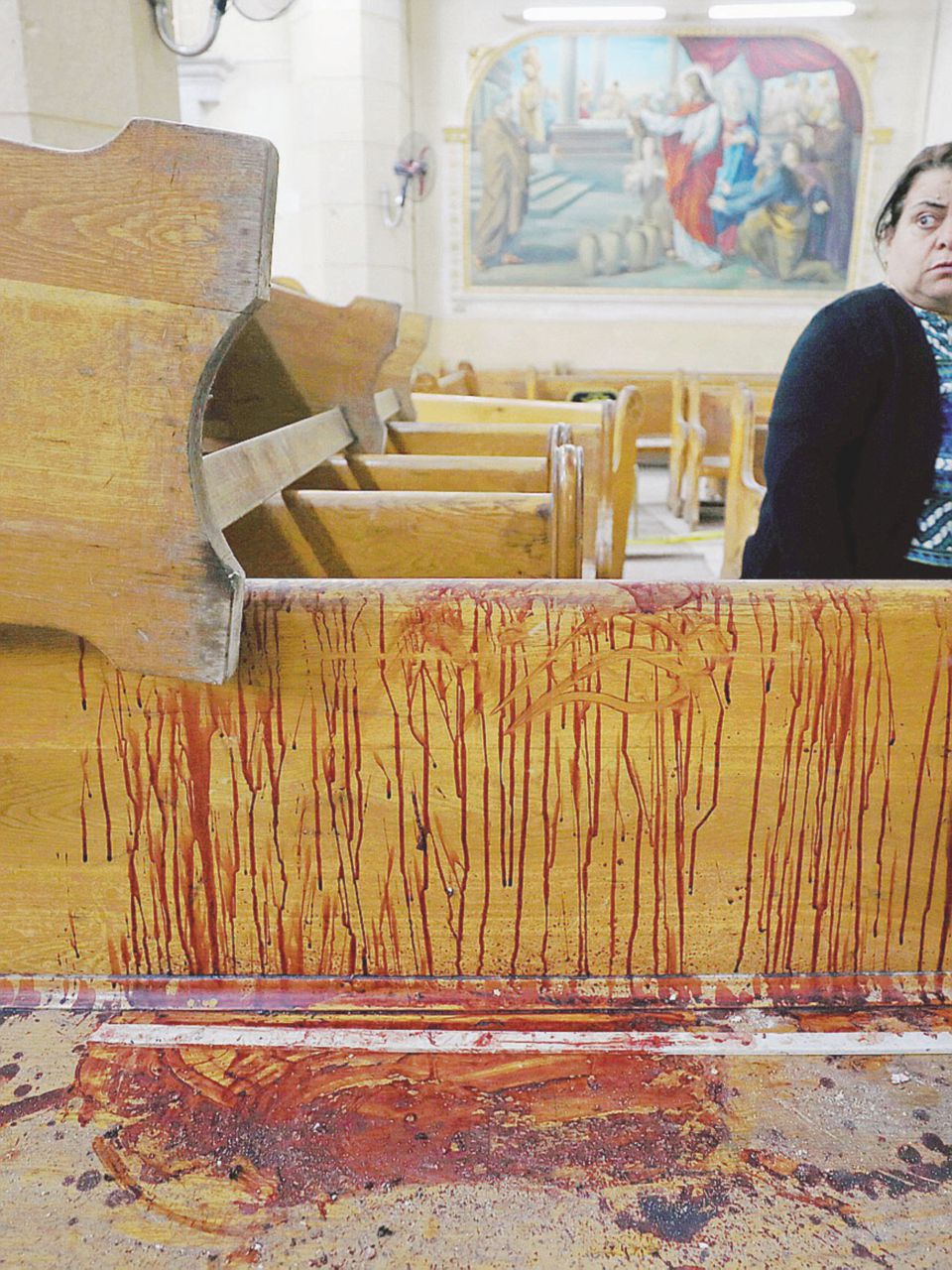Kamikaze in chiesa - La chiesa assaltata ad Alessandria - Reuters Il jihad colpisce i copti, ma il vero obiettivo è Al Sisi