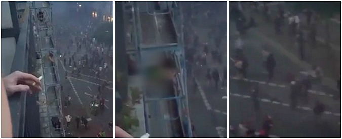 Copertina di Make love, not war. Coppia fa sesso sul balcone guardando le proteste anti-G20