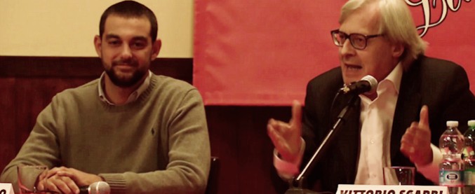 Copertina di Sgarbi ospite dei neofascisti critica la legge Fiano e attacca: “Alfano? Una merda. Boldrini? Al massimo cameriera di Nilde Iotti”