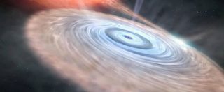 Copertina di Buchi neri, ecco quello più lontano mai osservato: ha una massa 800 milioni di volte quella del Sole