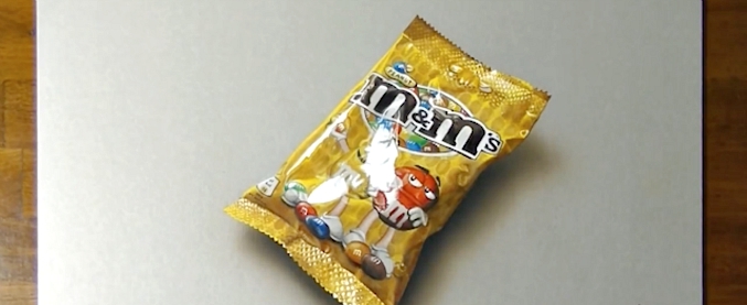Copertina di Questo pacchetto M&M’s non esiste. Per (non) credere ai vostri occhi basta affidarsi a Marcello Barenghi