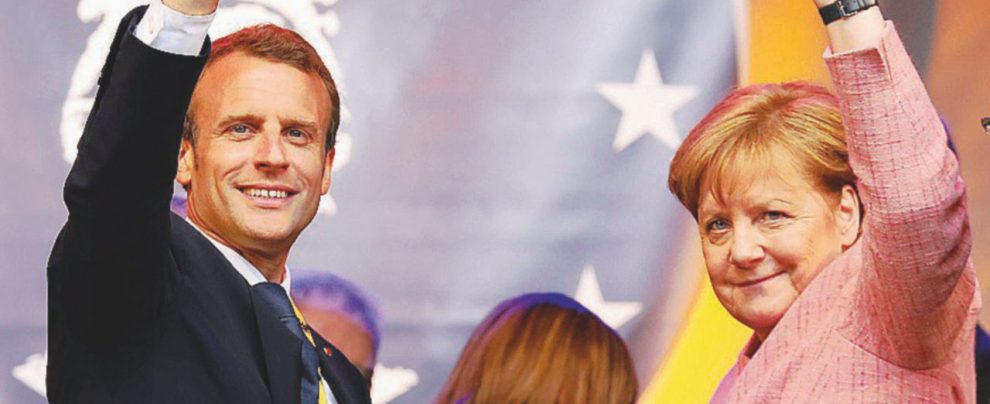 Accordi e dissonanze - Macron ieri con la Merkel - LaPresse La Merkel scarica Trump “Difendiamoci da soli”