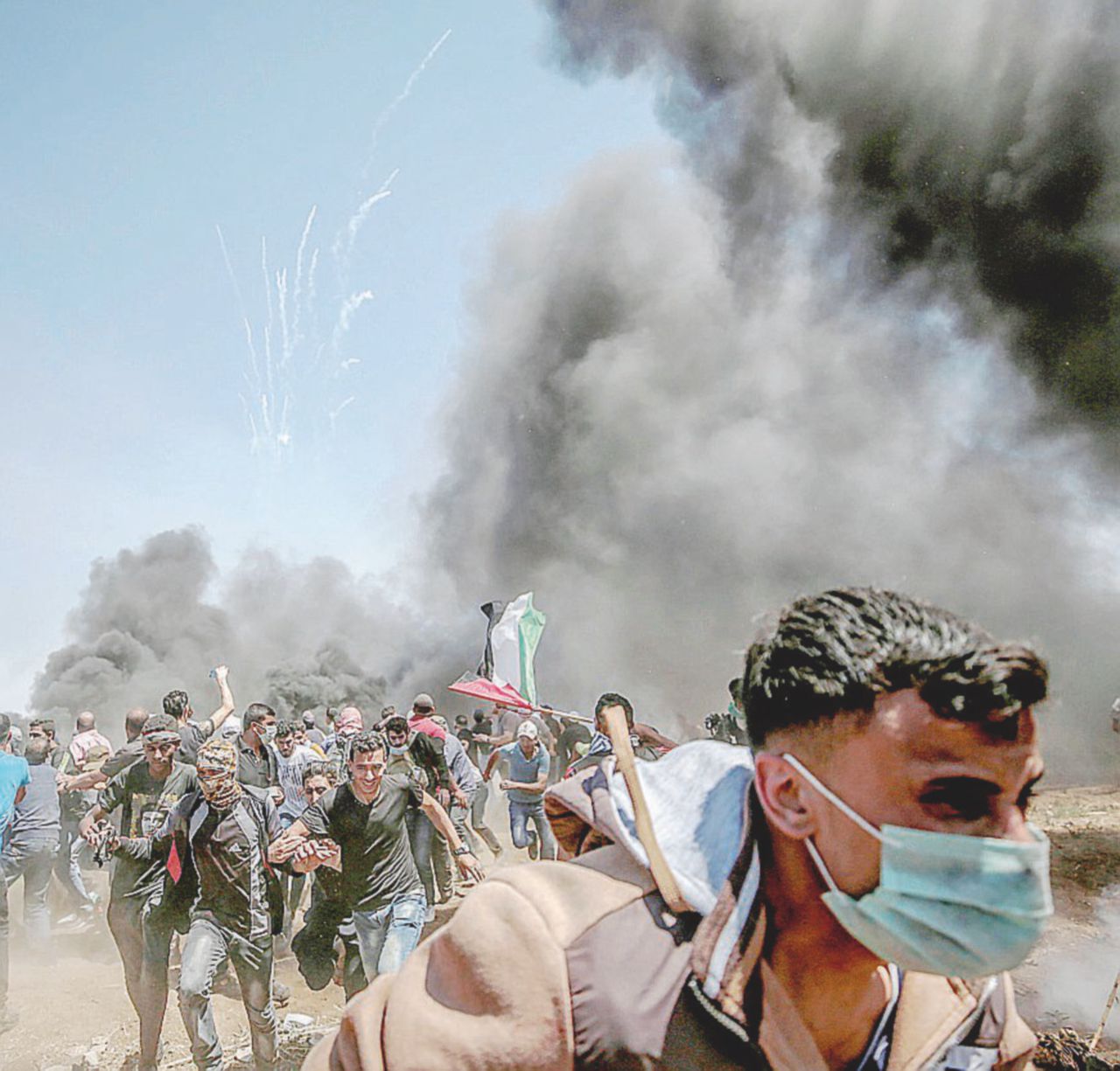 Organizzati - Palestinesi negli scontri al confine con Israele - Ansa Il senso di Hamas per il confine col filo spinato