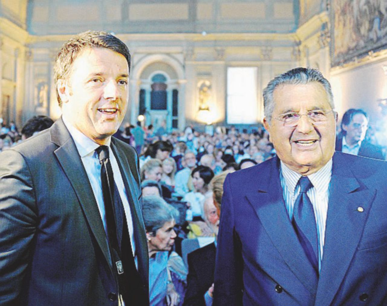Ex Gruppo Espresso - L’ex premier Matteo Renzi e il presidente di Gedi, Carlo De Benedetti - Ansa Popolari, verso un’altra archiviazione