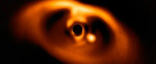 Copertina di Catturati i primi istanti di vita di un pianeta, la foto di PDS 70b osservato da Sphere