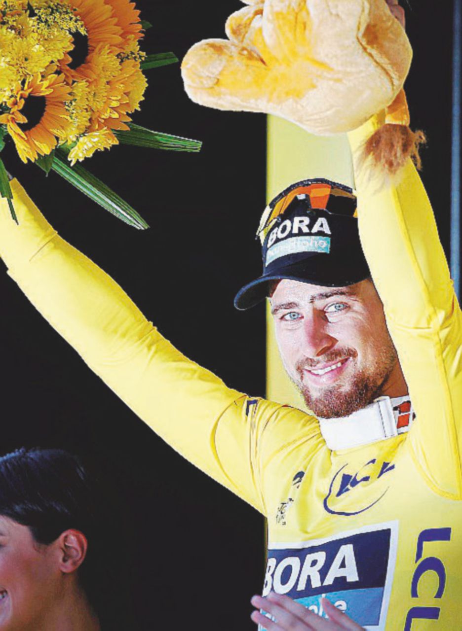 Copertina di Sagan vince la 2a tappa e prende la maglia gialla