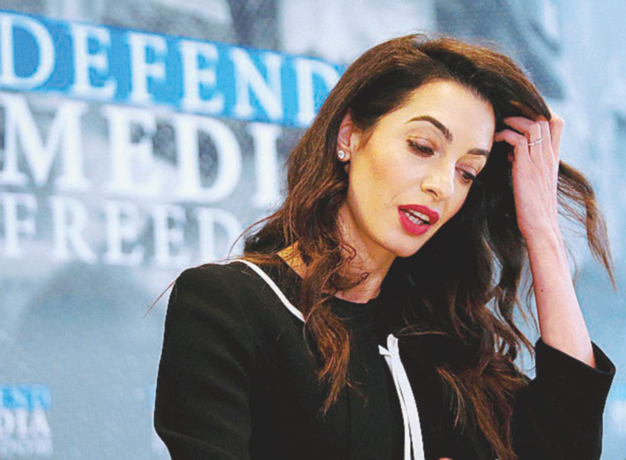 Amal Clooney e il processo agli orrori di Daesh