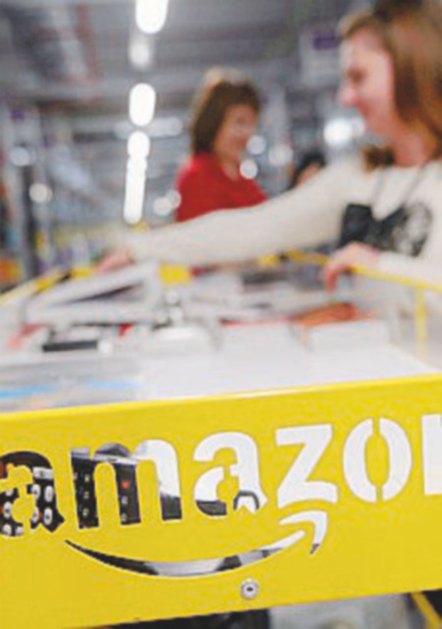 Copertina di “Amazon avvantaggia i venditori che usano la sua logistica”
