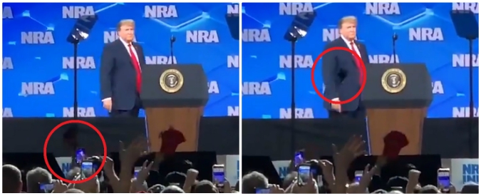 Copertina di Donald Trump si avvicina al microfono e un uomo gli lancia il cellulare: l’episodio alla convention sulle armi