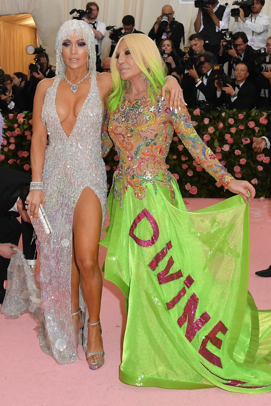Singer/songwriter Jennifer Lopez (L) and designer Donatella Versace (R) arrive for the 2019 Met Gala