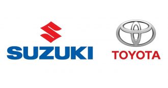 Copertina di Toyota e Suzuki, partnership e scambio di azioni. Obiettivi elettrificazione e guida autonoma
