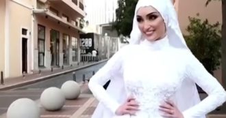 Copertina di La sposa in abito bianco davanti all’obiettivo del fotografo quando arriva l’esplosione a Beirut: il video