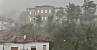 Tornado in Veronese, the force of the wind uncovers the roof of a building.  Video