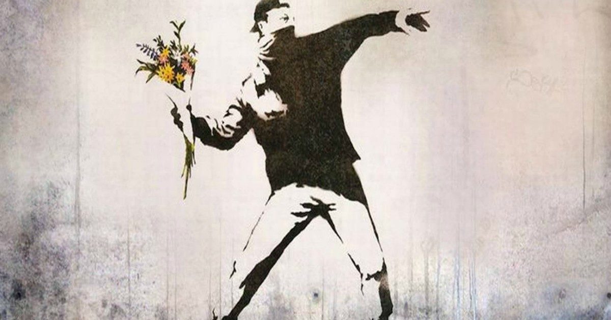 Banksy, “niente diritti a un anonimo”: l’Ue gli toglie il copyright del “Lanciatore di fiori”