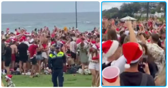 Copertina di La folle festa di Natale a Bronte Beach: centinaia di turisti ammassati senza mascherina, si teme un focolaio – Video