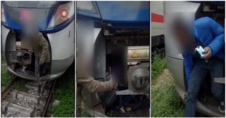Copertina di Ventimiglia, tre migranti respinti alla frontiera si nascondono nel locomotore di un treno per passare il confine con la Francia – Video