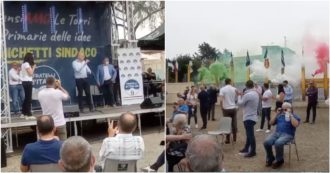 Copertina di Roma, il tour di Michetti nelle periferie parte all’insegna degli effetti speciali: fumogeni tricolore, applausi finti e poco pubblico (video)