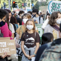 Swedish climate activist Greta Thunberg (C) and young climate activists march during a ‘Fridays for Future’, Milan – Italy, 1 October 2021. 
ANSA / MATTEO BAZZI