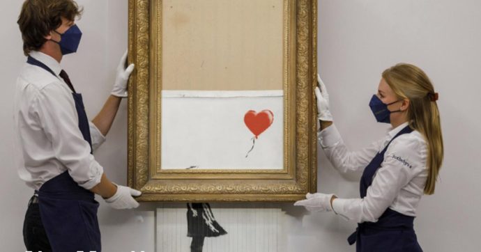 Banksy, la sua tela sminuzzata ‘Love is in the bin” venduta al prezzo record di 22 milioni di euro