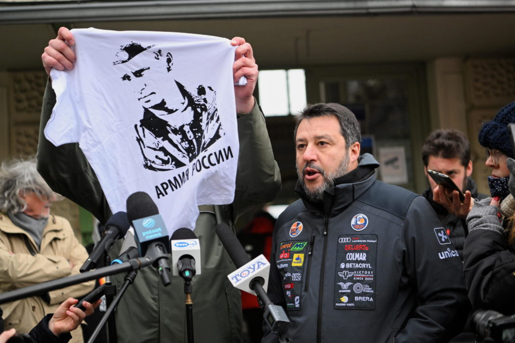 epa09809950 Mayor of Przemysl Wojciech Bakun shows a t-shirt with putin’s Portrait and slogan ‘Russian Army’ during a press conference with Former Deputy Prime Minister of Italy, and Lega leader Matteo Salvini (R) in front of the Main Railway Station in Przemysl, Poland 08 March 2022. Mayor Bakun unsuccessfully tried to hand Matteo Salvini a T-shirt with an image of Vladimir Putin, similar to one Salvini was posing with at Kremlin during a visit to Moscow and asked the italian senator to wear it during a visit to refugees reception center close to the border with Ukraine.  EPA/DAREK DELMANOWICZ POLAND OUT
