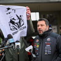 epa09809950 Mayor of Przemysl Wojciech Bakun shows a t-shirt with putin’s Portrait and slogan ‘Russian Army’ during a press conference with Former Deputy Prime Minister of Italy, and Lega leader Matteo Salvini (R) in front of the Main Railway Station in Przemysl, Poland 08 March 2022. Mayor Bakun unsuccessfully tried to hand Matteo Salvini a T-shirt with an image of Vladimir Putin, similar to one Salvini was posing with at Kremlin during a visit to Moscow and asked the italian senator to wear it during a visit to refugees reception center close to the border with Ukraine.  EPA/DAREK DELMANOWICZ POLAND OUT