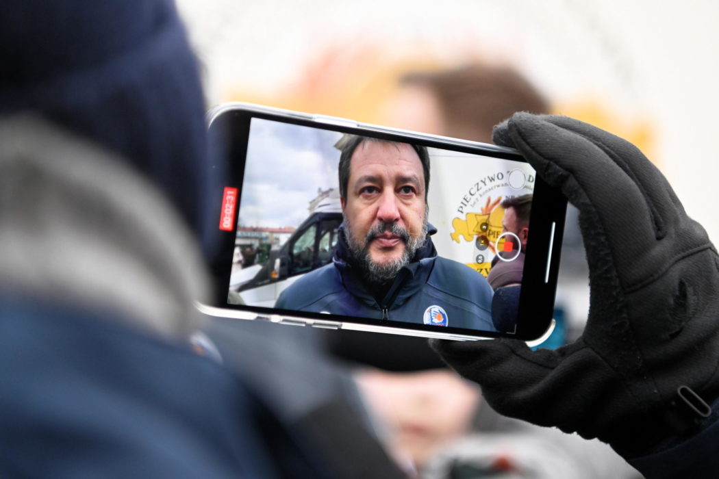 epa09809953 Former Deputy Prime Minister of Italy, and Lega leader Matteo Salvini during a press conference with Mayor of Przemysl Wojciech Bakun in front of the Main Railway Station in Przemysl, Poland 08 March 2022. Mayor Bakun unsuccessfully tried to hand Matteo Salvini a T-shirt with an image of Vladimir Putin, similar to one Salvini was posing with at Kremlin during a visit to Moscow and asked the italian senator to wear it during a visit to refugees reception center close to the border with Ukraine.  EPA/DAREK DELMANOWICZ POLAND OUT