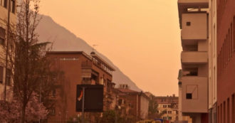 Copertina di Bolzano, cielo arancione sopra la città: è la sabbia del Sahara – Video