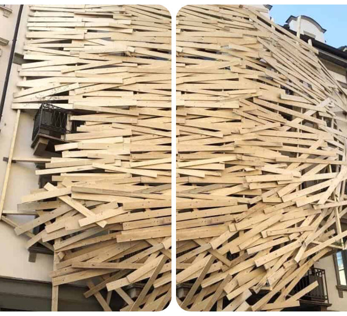 Milano, ecco perché alcuni edifici sono coperti di assi di legno