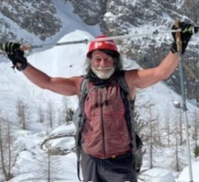 Mauro Corona in canottiera in mezzo alla tempesta di neve: così ha partecipato alla Staffetta alpina di Misurina