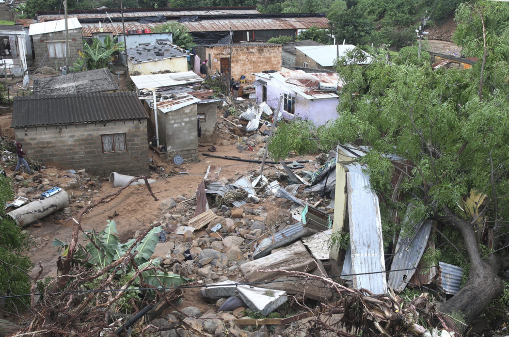 People’s homes swept away in Ntuzuma, outside Durban, South Africa, Tuesday, April 12, 2022. Prolonged rains and flooding in South Africa’s KwaZulu-Natal province have claimed dozens of lives, according to local officials. (AP Photo/Str)