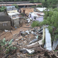 People’s homes swept away in Ntuzuma, outside Durban, South Africa, Tuesday, April 12, 2022. Prolonged rains and flooding in South Africa’s KwaZulu-Natal province have claimed dozens of lives, according to local officials. (AP Photo/Str)