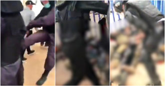 Copertina di Calci, manganellate e spintoni: la violenza della polizia marocchina a Melilla sui migranti inermi per terra – Video