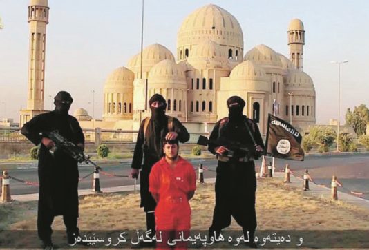Obama fa l’indeciso e l’Isis gli manda  un messaggio: la testa di un curdo