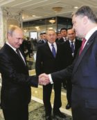 Copertina di Putin gioca al gatto col topo