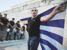 Copertina di Pochi e tristi, l’ala radicale in piazza finisce bruciando la bandiera del partito