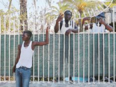 Copertina di L’Italia nera dei caporali, una terra di ghetti e lager