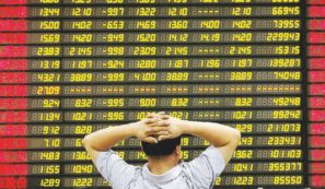 Copertina di Cina, vietato parlare di Borsa: un giornalista scrive e finisce in galera