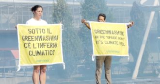 Copertina di Milano, l’azione di Greenpeace all’incontro mondiale delle aziende del gas: “Sotto il greenwashing c’è l’inferno climatico”