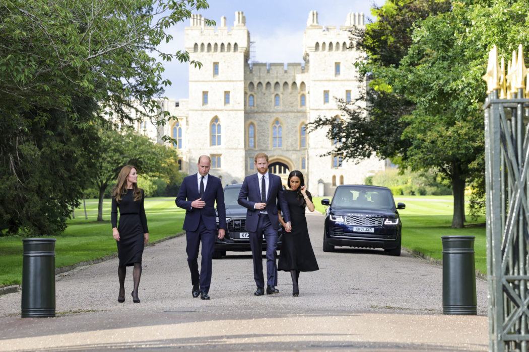 From left, Britain’s Kate, Princess of Wales, Prince William, Prince of Wales, Prince Harry, and Meghan, Duchess of Sussex walk to meet members of the public, at Windsor Castle, following the death of Queen Elizabeth II on Thursday, in Windsor, England, Saturday, Sept. 10, 2022. (Chris Jackson/Pool Photo via AP)